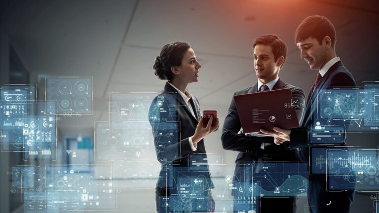 Three professionals discuss data with digital interfaces, symbolizing online growth.