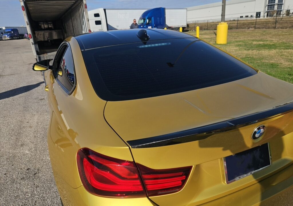 BMW M4  with an enclosed trailer