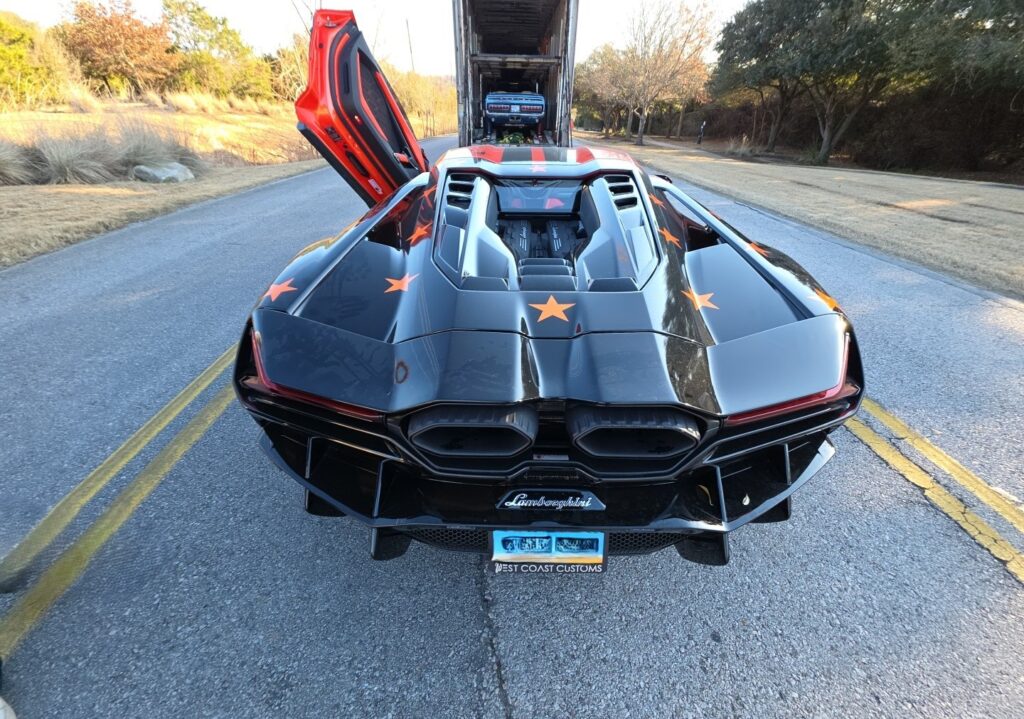 2025 Lamborghini revuelto with an enclosed trailer