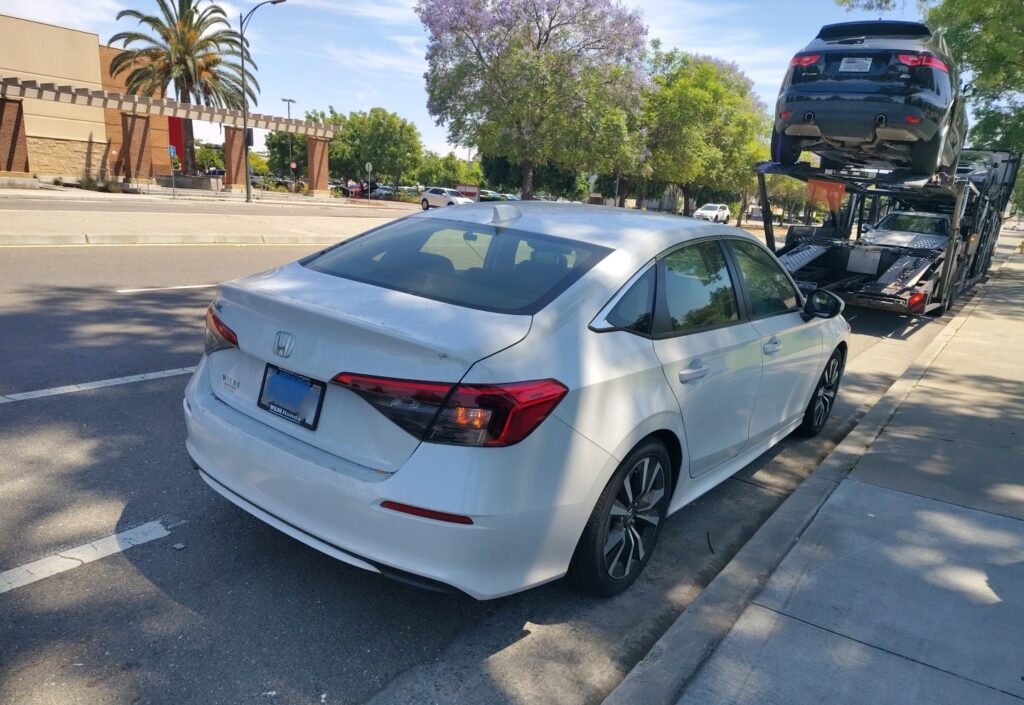 2022 Honda Civic with an open trailer
