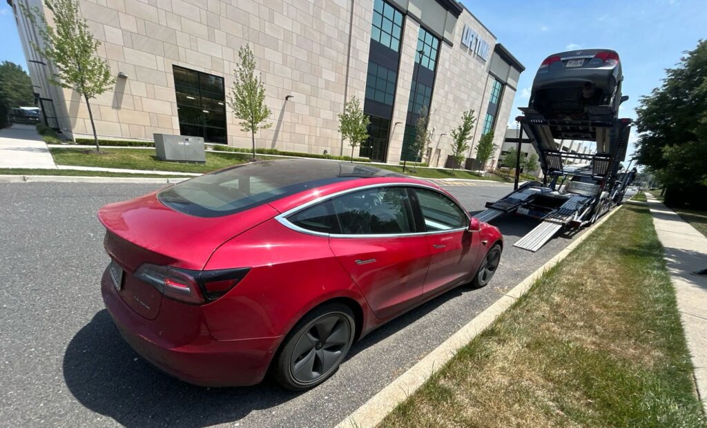 2020 Tesla Model 3 open trailer