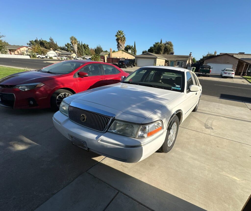 2005 Mercury Grand Marquis and 2015 Toyota Corolla
