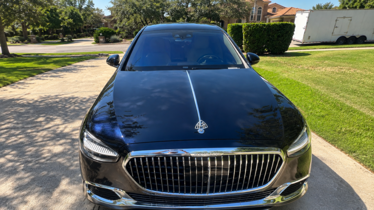 Glossy Black Maybach in Suburban Driveway